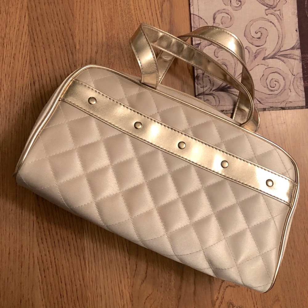 Small gold makeup bag